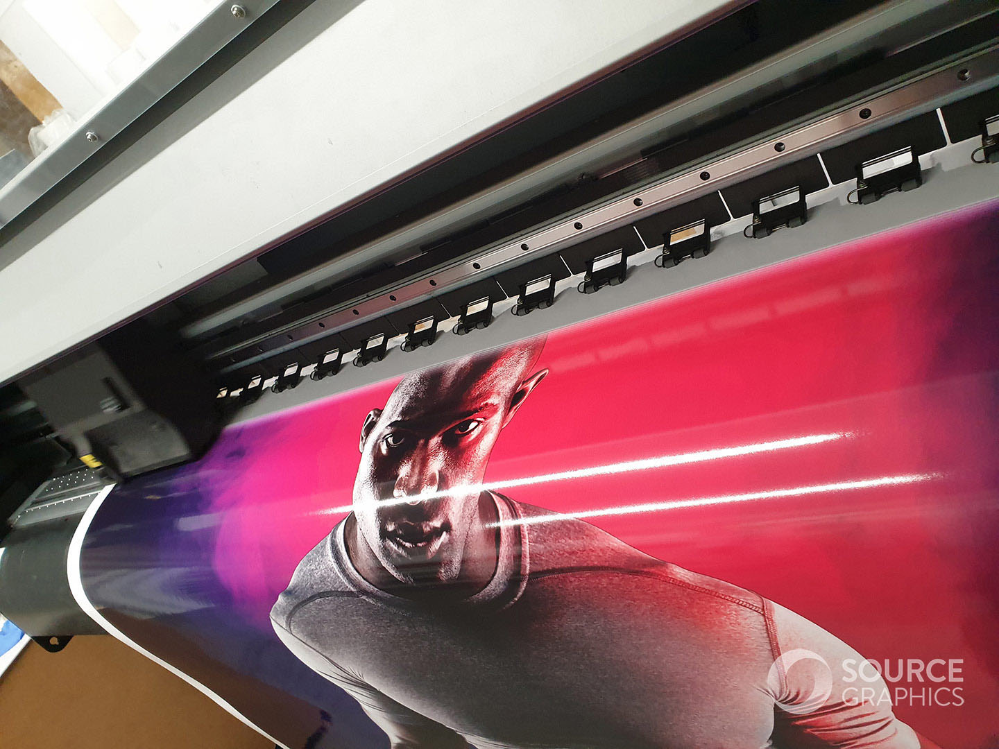 large-digital-printer-printing-source-graphics